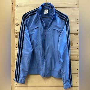 Adidas, periwinkle blue windbreaker, from the early 2000s
